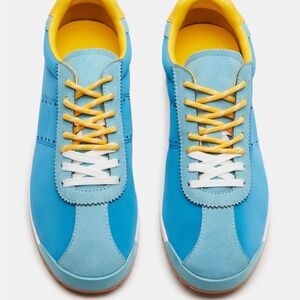 Blue and Yellow Steve Madden Mirage sneakers